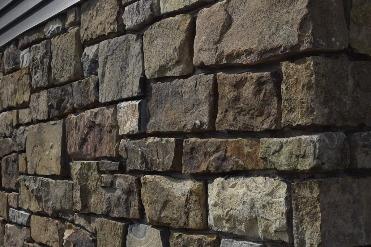 Detailed exterior stonework on a custom-built home in Middle Tennessee by Doxa Custom Homes