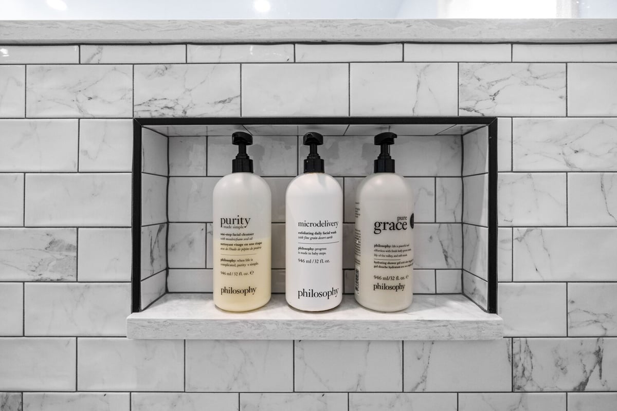 Close-up of tiled shelf in custom bathroom by Doxa Custom Homes in Murfreesboro, TN