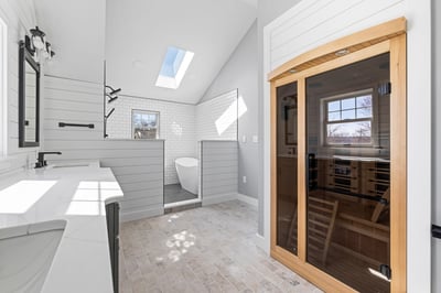 Luxury bathroom with sauna, shower, and freestanding tub by Doxa Custom Homes in Crossville, TN
